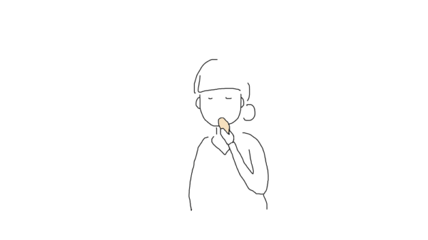 目を閉じてお土産のお菓子を食べる